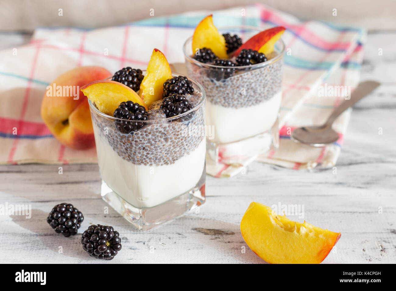 Chia seed pudding with yogurt, peach and blackberries. Healthy