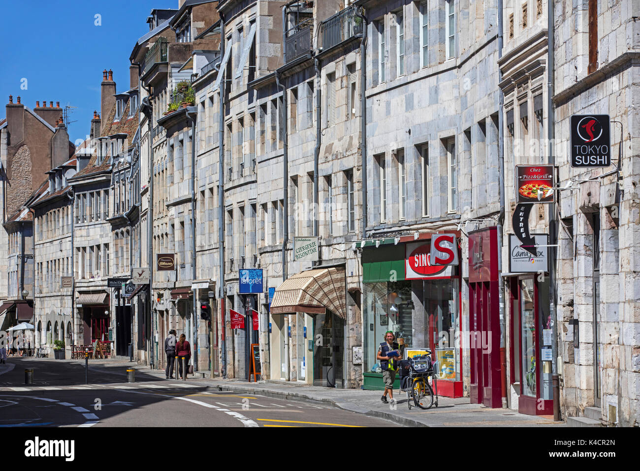 Shops in main street of the old city center of Besançon, Doubs, Bourgogne-Franche-Comté, France Stock Photo