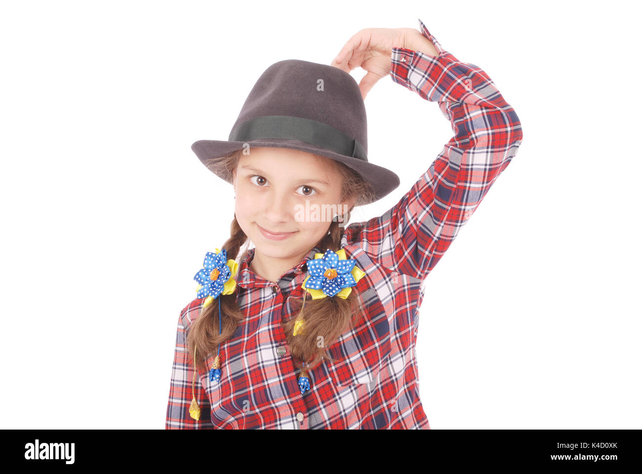 Portrait of adorable smiling little girl with her hat, isolated on a ...