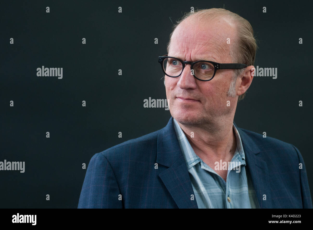 English comedian, actor, writer, musician, television presenter and director Adrian Edmondson attends a photocall during the Edinburgh International B Stock Photo