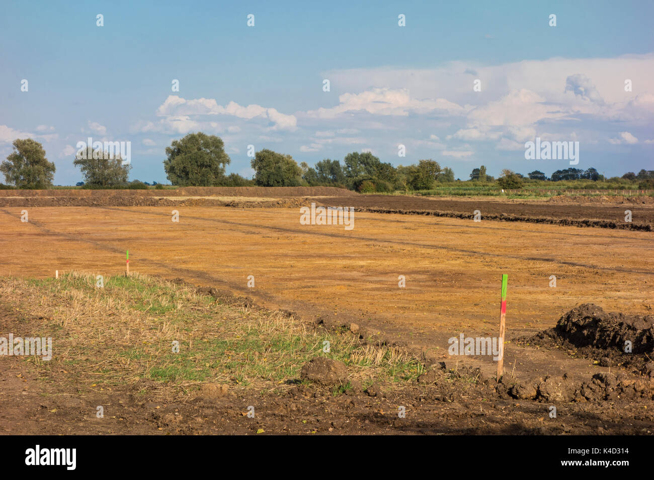 View of field from which top soil has been removed prior to gravel extraction, Cottenham, Cambridgeshire, England Stock Photo