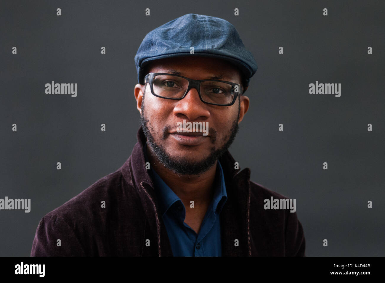 Nigerian-American writer, photographer, and art historian Teju Cole attends a photocall during the Edinburgh International Book Festival on August 12, Stock Photo