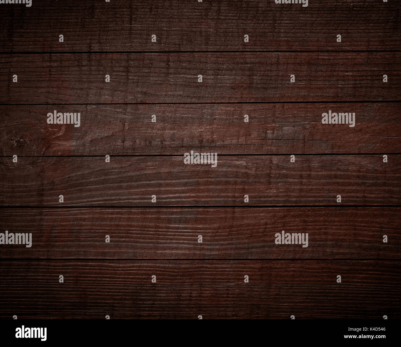 Brown wooden wall, planks, table, floor surface. Dark wood texture. Stock Photo