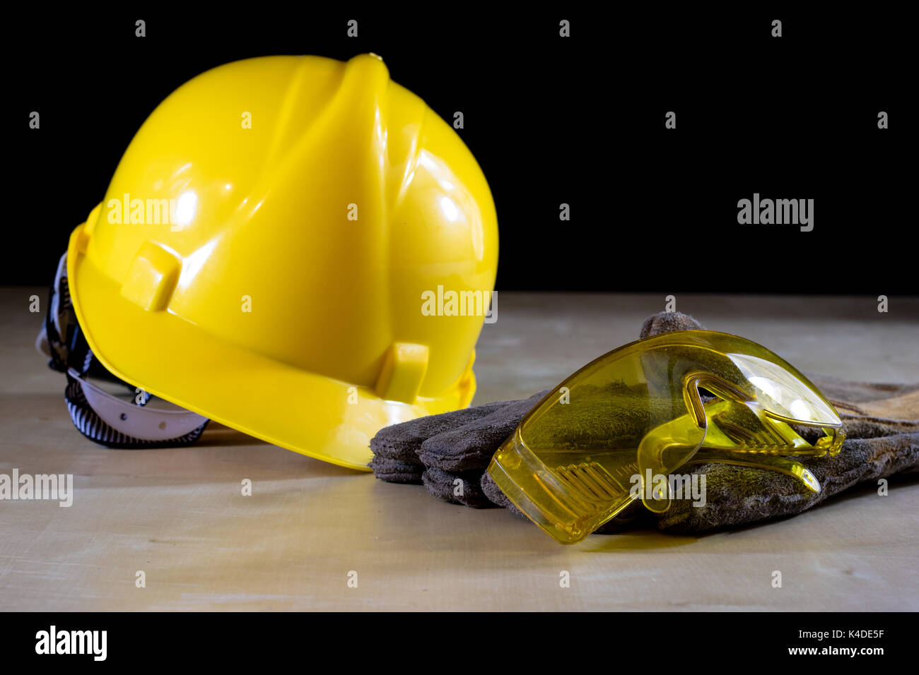Download Yellow Helmet Safety Goggles And Work Gloves For The Worker Black Stock Photo Alamy PSD Mockup Templates