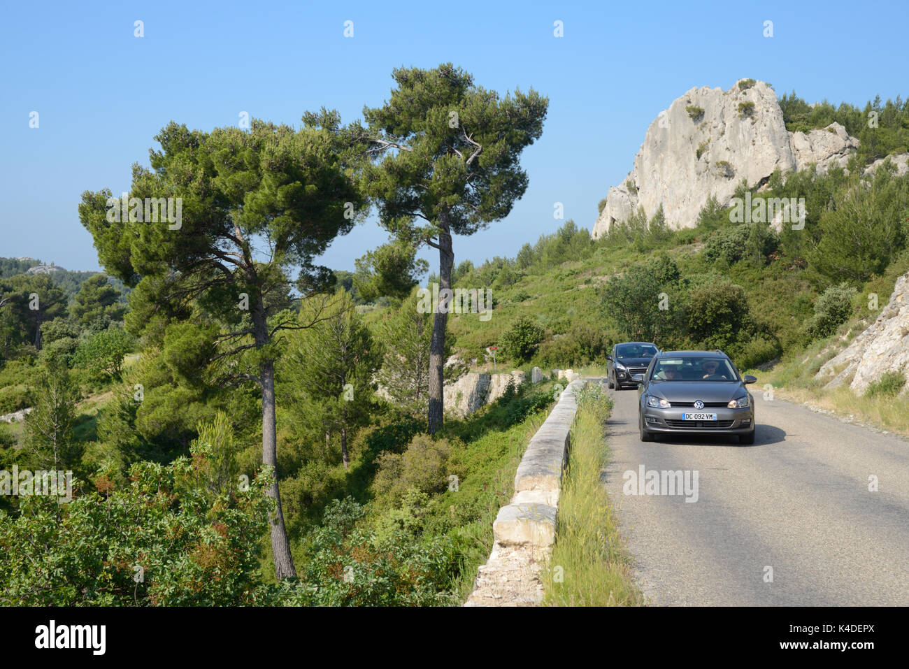 Motoring along Country Road or Lane near Les Baux-de-Provence in the Les Alpilles Hlls Regional Park, Provence, France Stock Photo