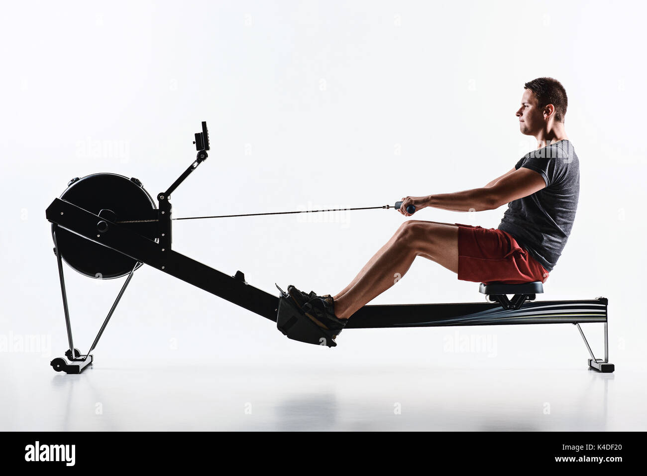 Man using fitness machine build hi-res stock photography and images - Alamy