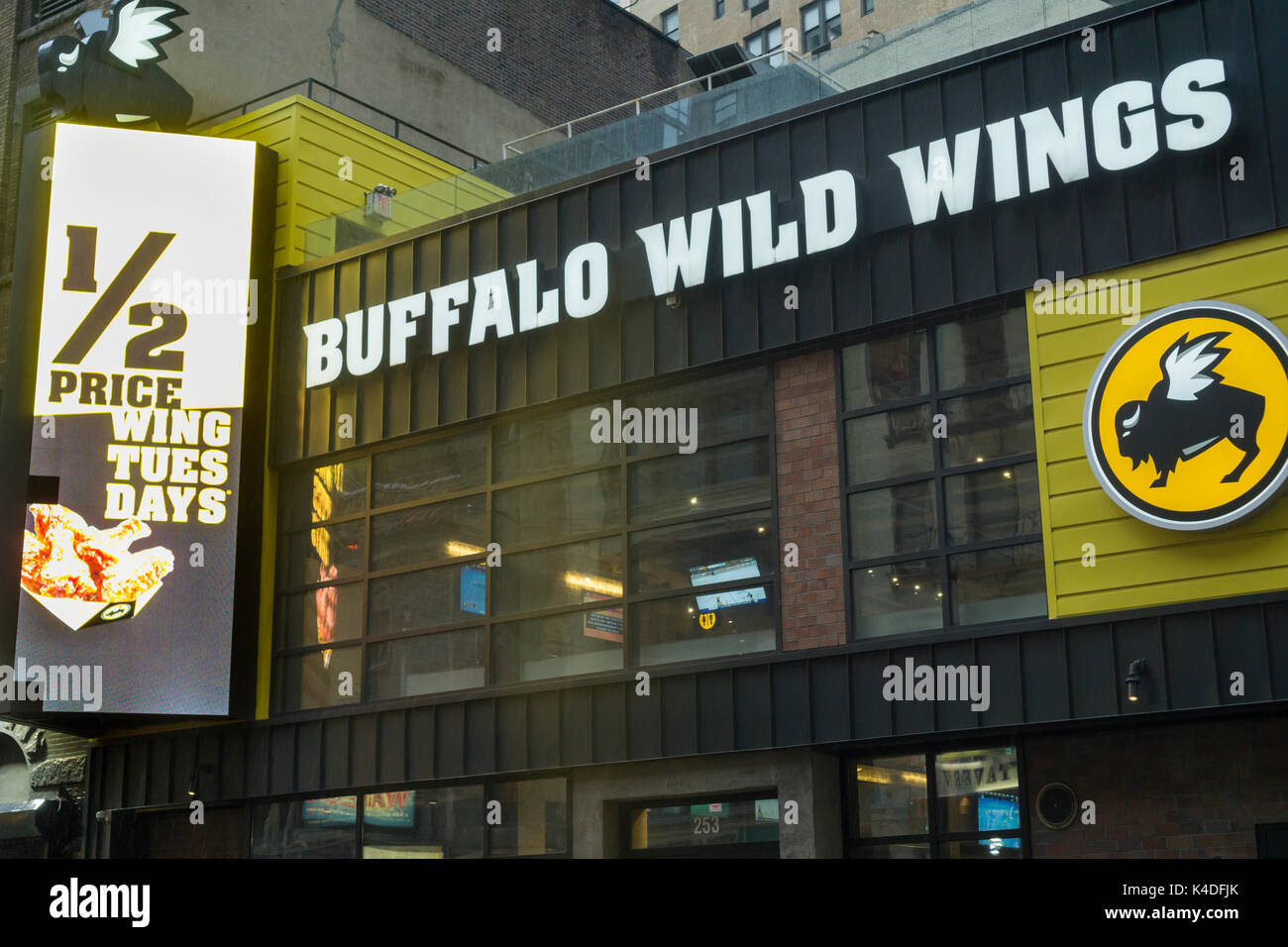 The Times Square branch of the Buffalo Wild Wings restaurant chain in Stock  Photo - Alamy