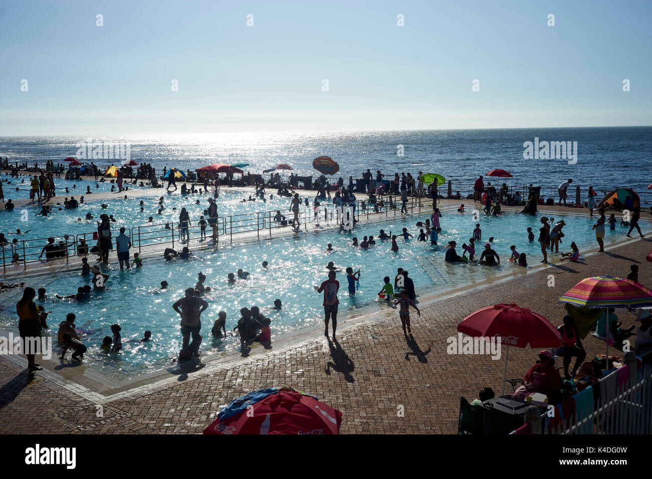 Many people in the pools directly at the sea in Cape Town, South Africa Stock Photo