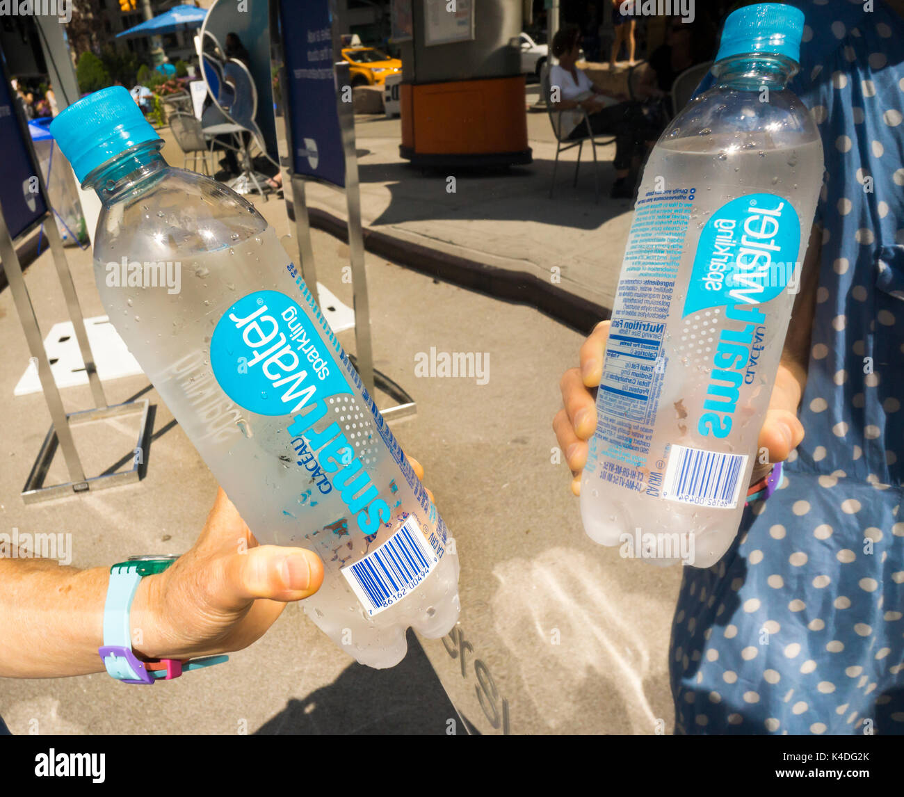 Visitors at a SmartWater branding event in Flatiron Plaza in New York on Thursday, August 24, 2017. SmartWater is vapor-distilled with electrolytes added and is brand of the Coca-Cola Co. (© Richard B. Levine) Stock Photo