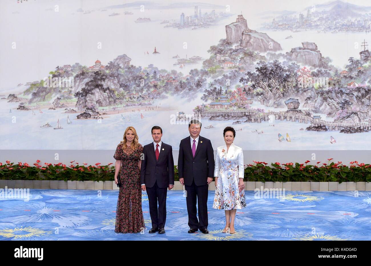 Mexican President Enrique Pena Nieto and his wife Angelica Rivera, right, stand with Chinese President Xi Jinping and his wife Peng Liyuan before the start of the official reception September 5, 2017 in Xiamen, China. Stock Photo