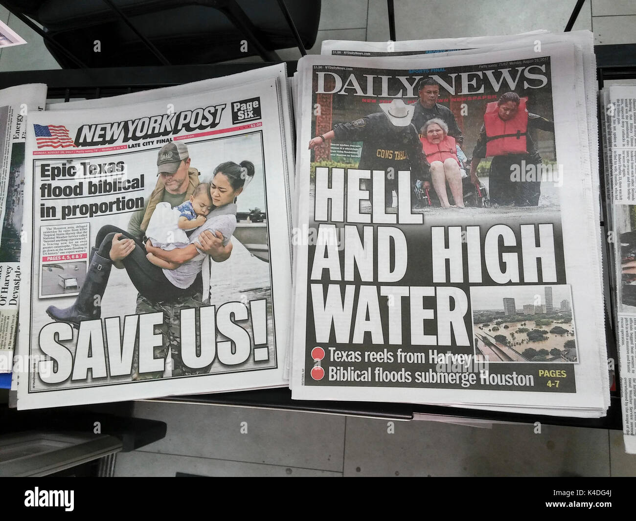 Copies of the fiercely competitive New York Daily News and the New York Post on Monday, August 28, 2017 report on the effects of Tropical Storm Harvey on Houston, TX and the surrounding areas. (© Richard B. Levine) Stock Photo