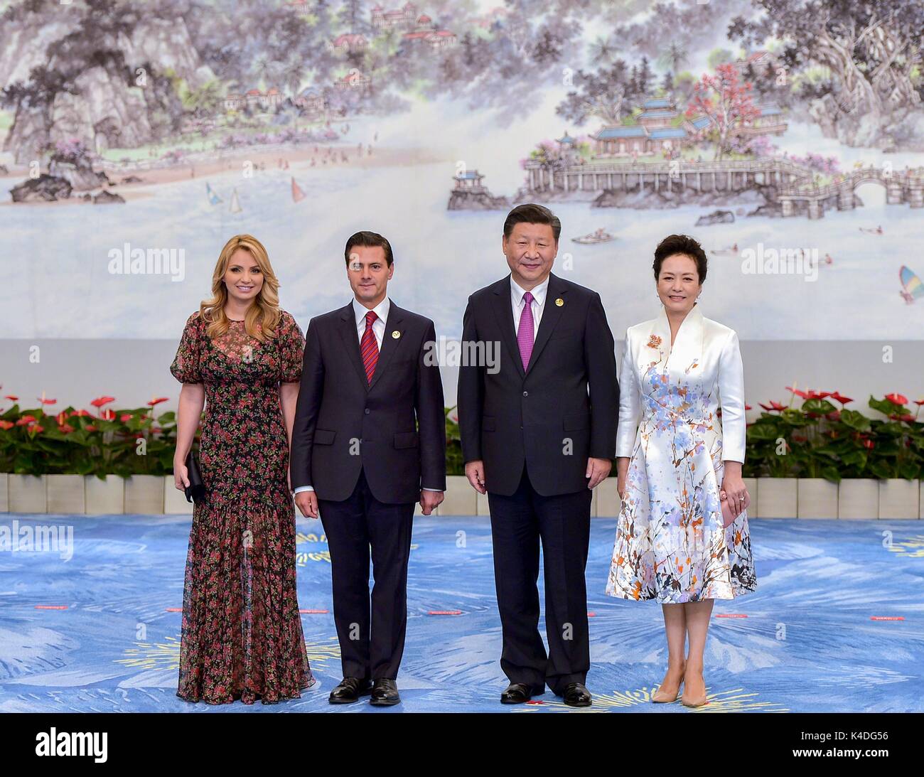 Mexican President Enrique Pena Nieto and his wife Angelica Rivera, right, stand with Chinese President Xi Jinping and his wife Peng Liyuan before the start of the official reception September 5, 2017 in Xiamen, China. Stock Photo