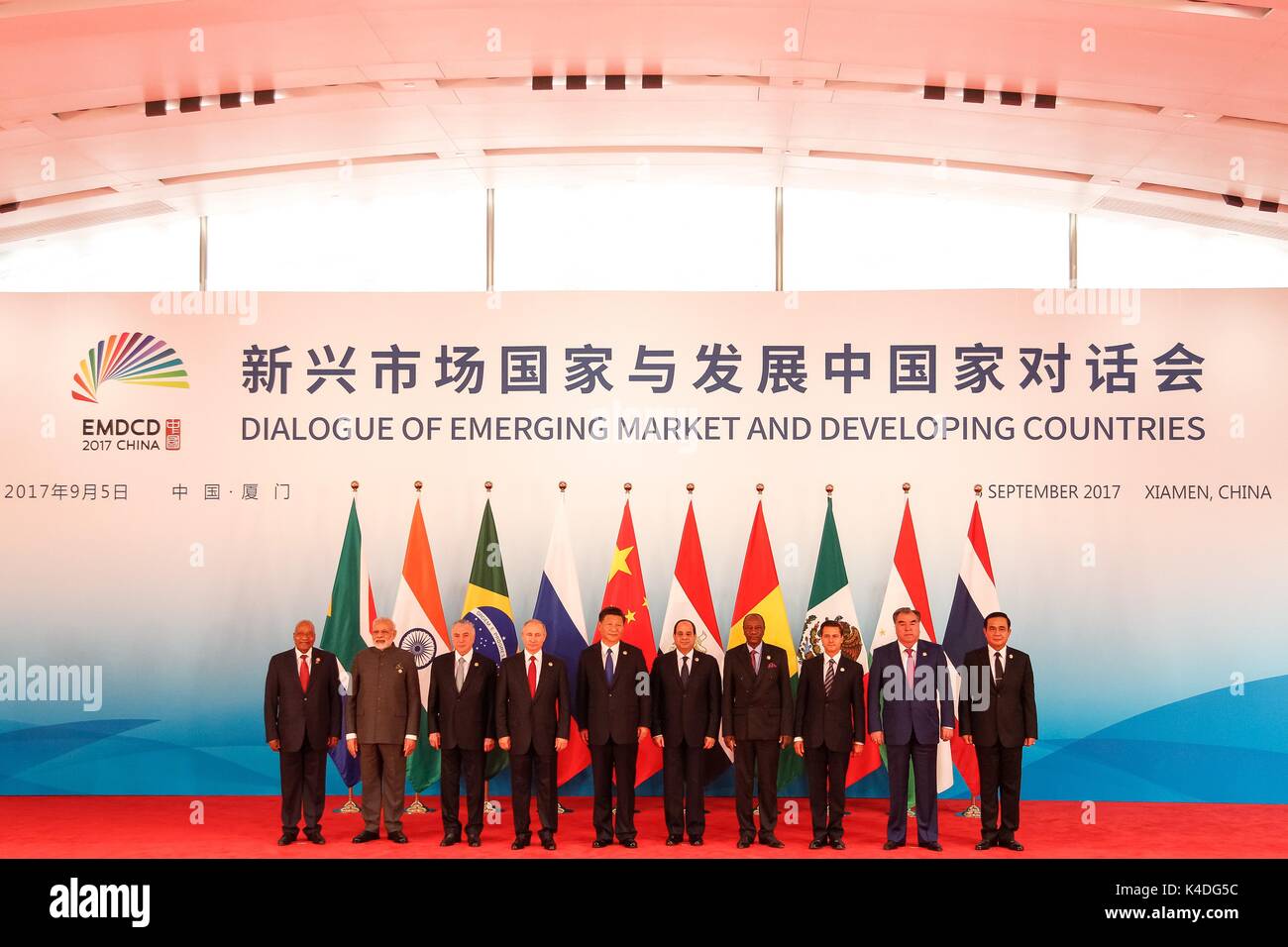 Leaders attending the BRICS Summit meeting on the Dialogue of Emerging Market and Developing Countries stand together for a family photo September 5, 2017 in Xiamen, China. Left to right are: South African President Jacob Zuma, Indian Prime Minister Narendra Modi, Brazilian President Michel Temer, Russian President Vladimir Putin, Chinese President Xi Jinping, Egyptian President Abdel-Fattah el-Sissi, Guinean President Alpha Conde, Mexican President Enrique Pena Nieto, Tajik President Emomali Rahmon and Thai Prime Minister Prayuth Chan-ocha. Stock Photo