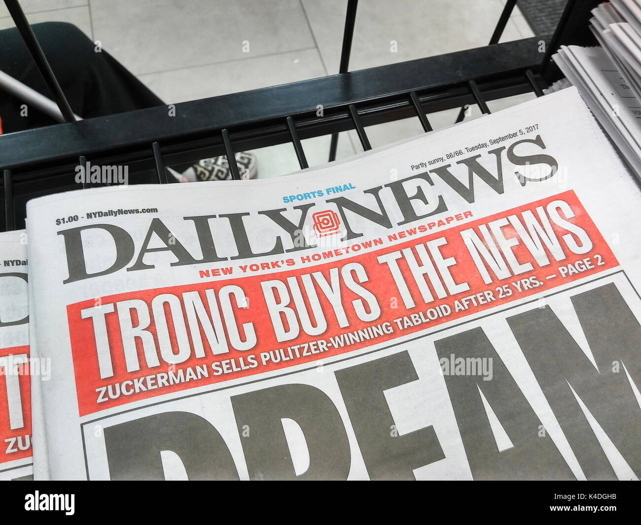 The headline on the front page of the New York Daily News tabloid on Tuesday, September 5, 2017 screams that the paper has been sold to the media conglomerate Tronc, formerly the Tribune Co. Tronc owns the Los Angeles Times, the Chicago Tribune, the Baltimore Sun and a number of regional newspapers. Mortimer Zuckerman has owned the paper for 25 years and is reported to have sold it for $1 and the assumption of millions in liabilities. (© Richard B. Levine) Stock Photo