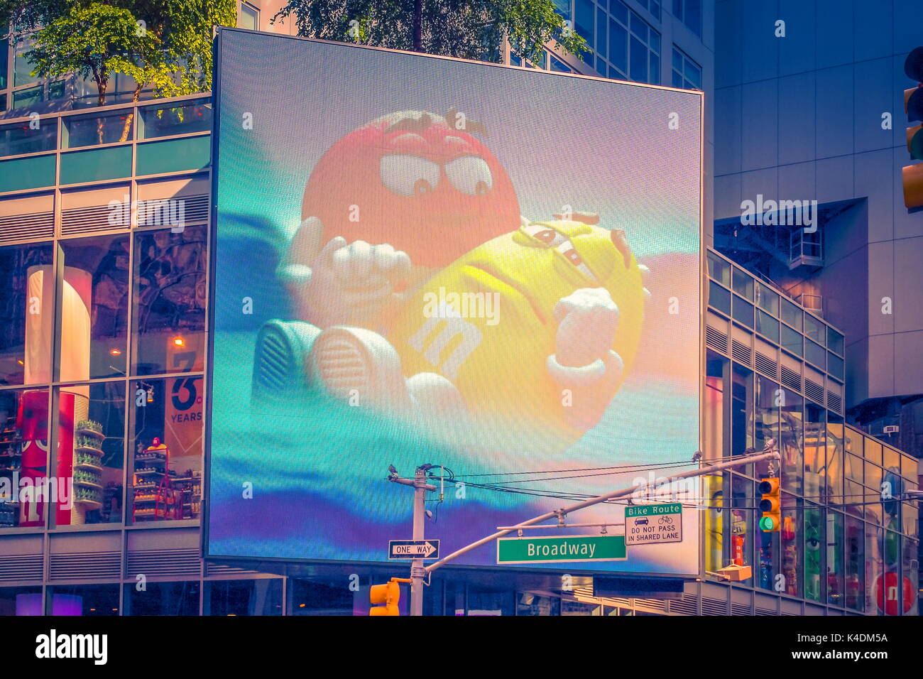 New York, USA - September 27, 2016: Giant billboard showing  M and M Candy on the streets of Broadway. Stock Photo