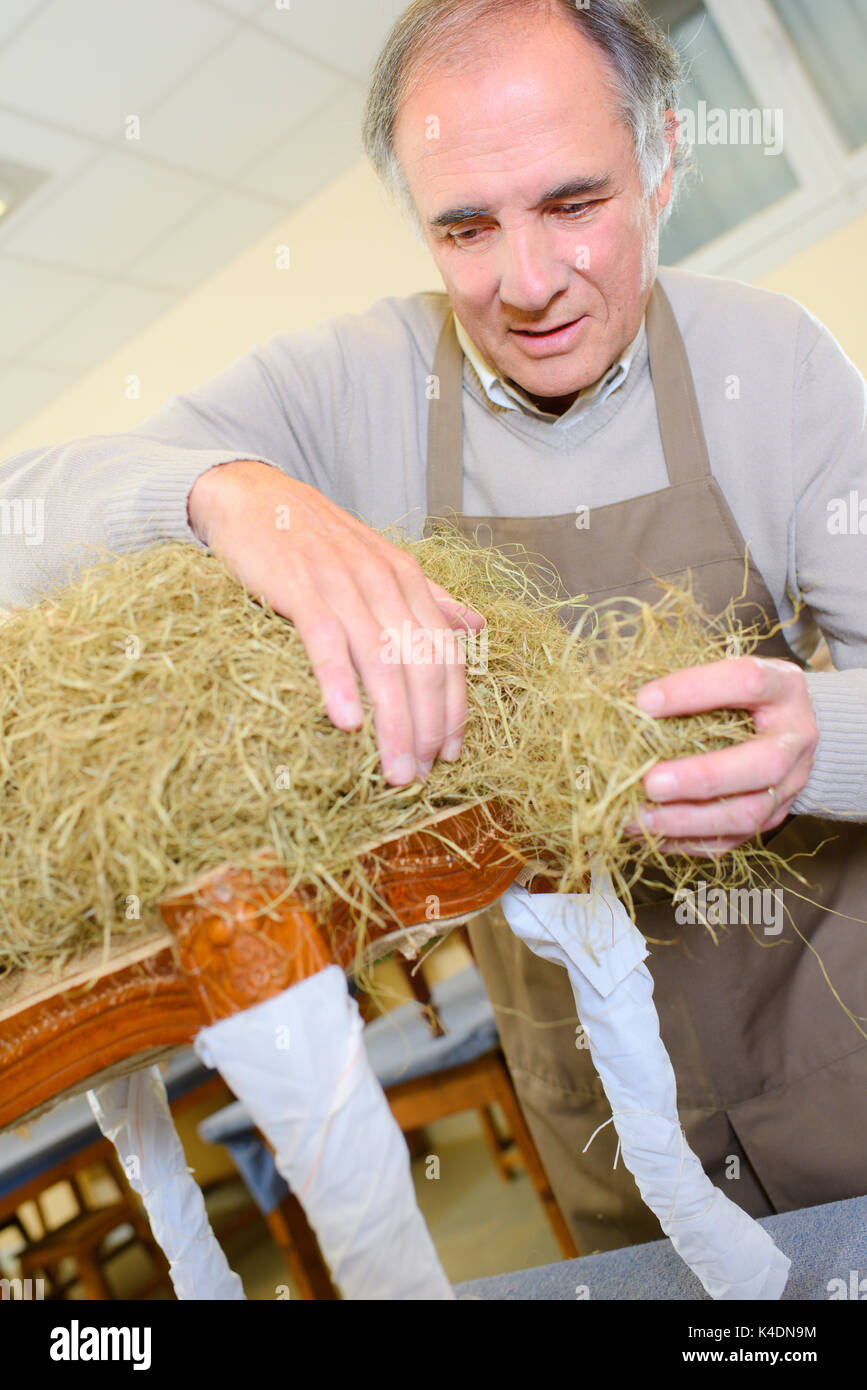 Upholstery furniture restoration hires stock photography and images
