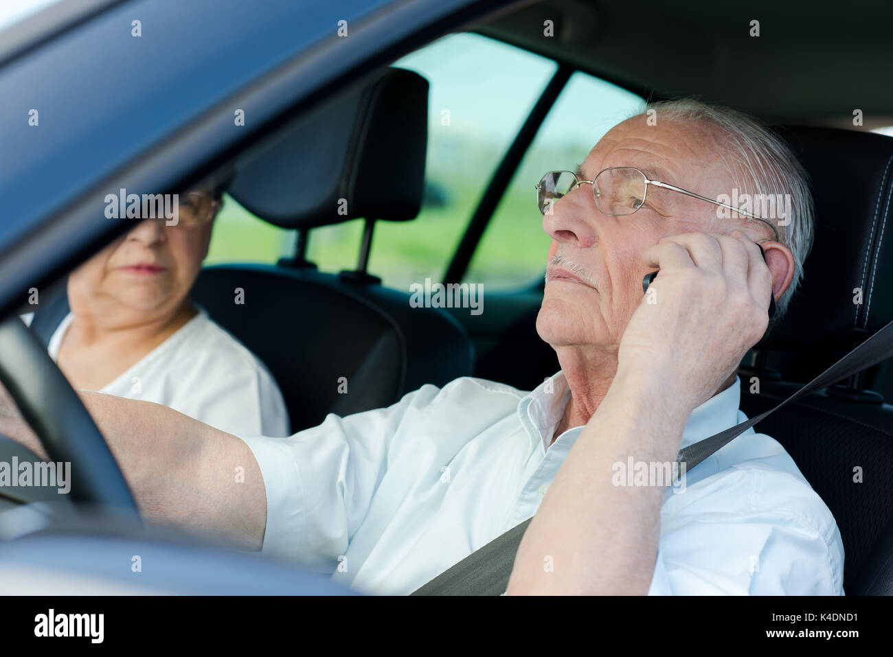 Old man on phone while driving hi-res stock photography and images - Alamy