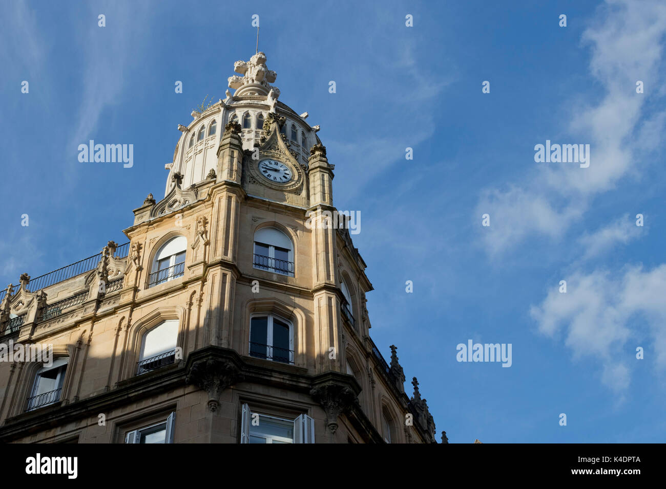 Clock tower in an old classic building (Donostia, Guipuzcoa). Stock Photo