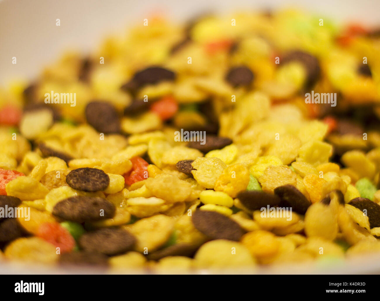 Corn flakes and chocolate flakes for breakfast. Selective focus Stock Photo
