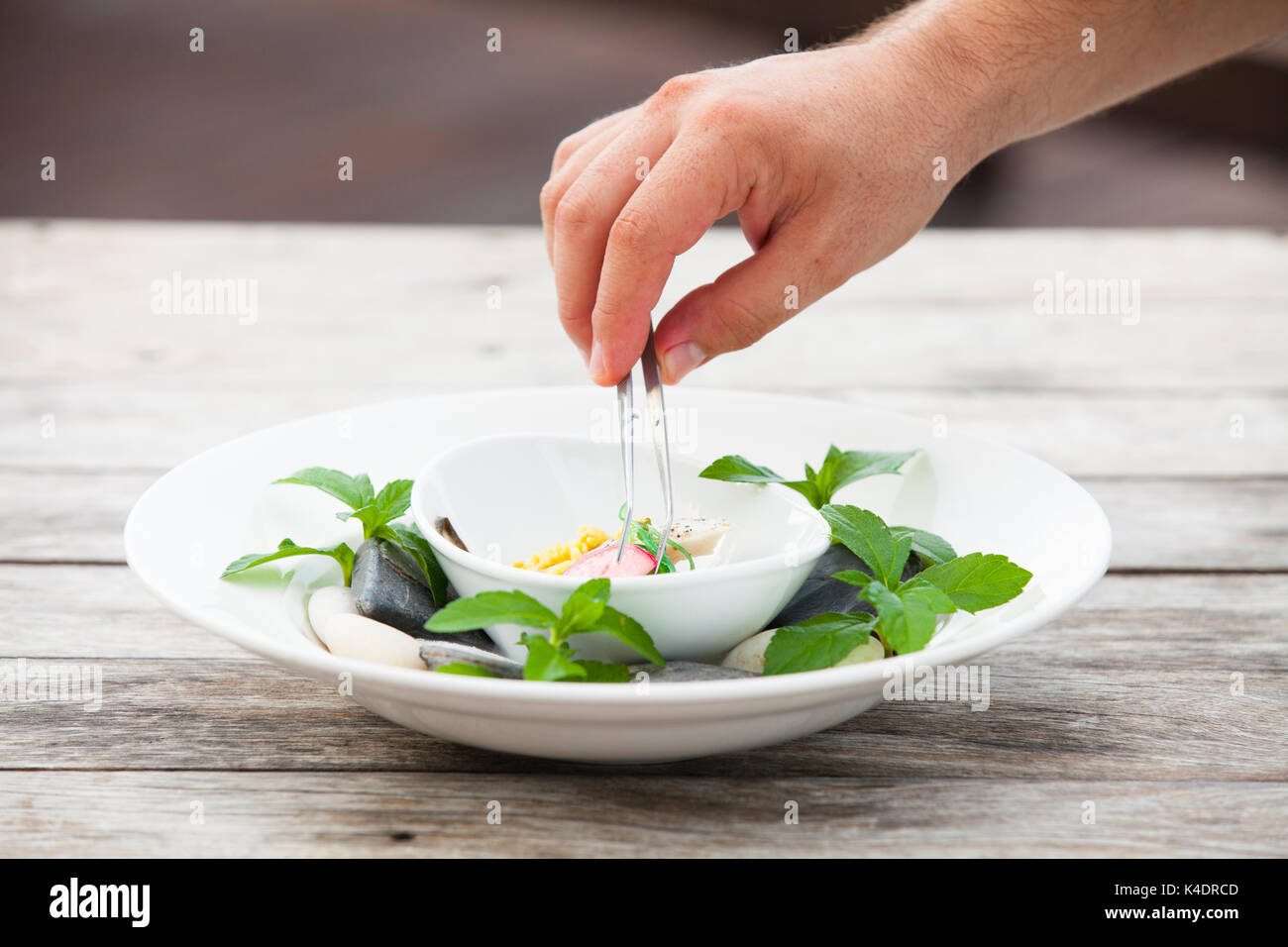 Closeup of Human hands cooking in kitchen Stock Photo - Alamy