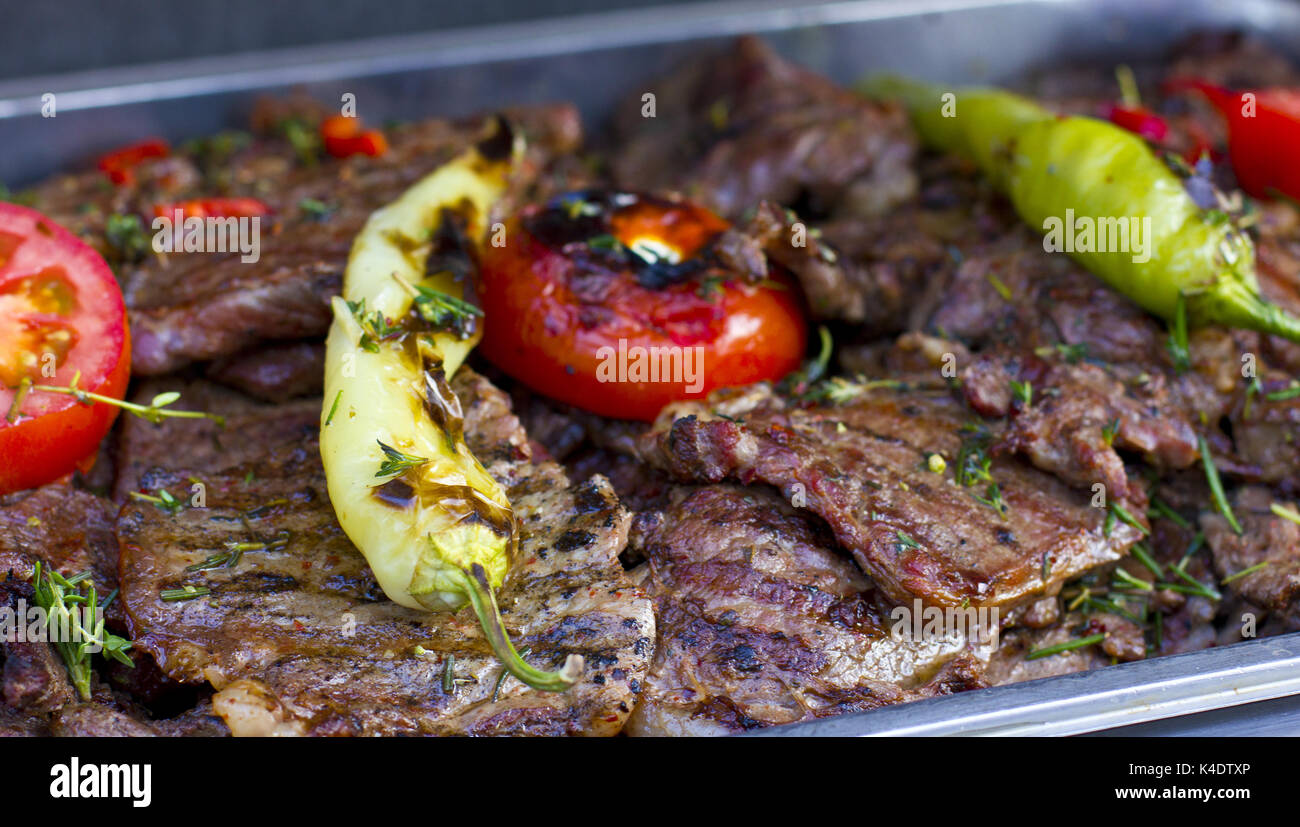 Beef grilled with peppers and tomatoes Stock Photo
