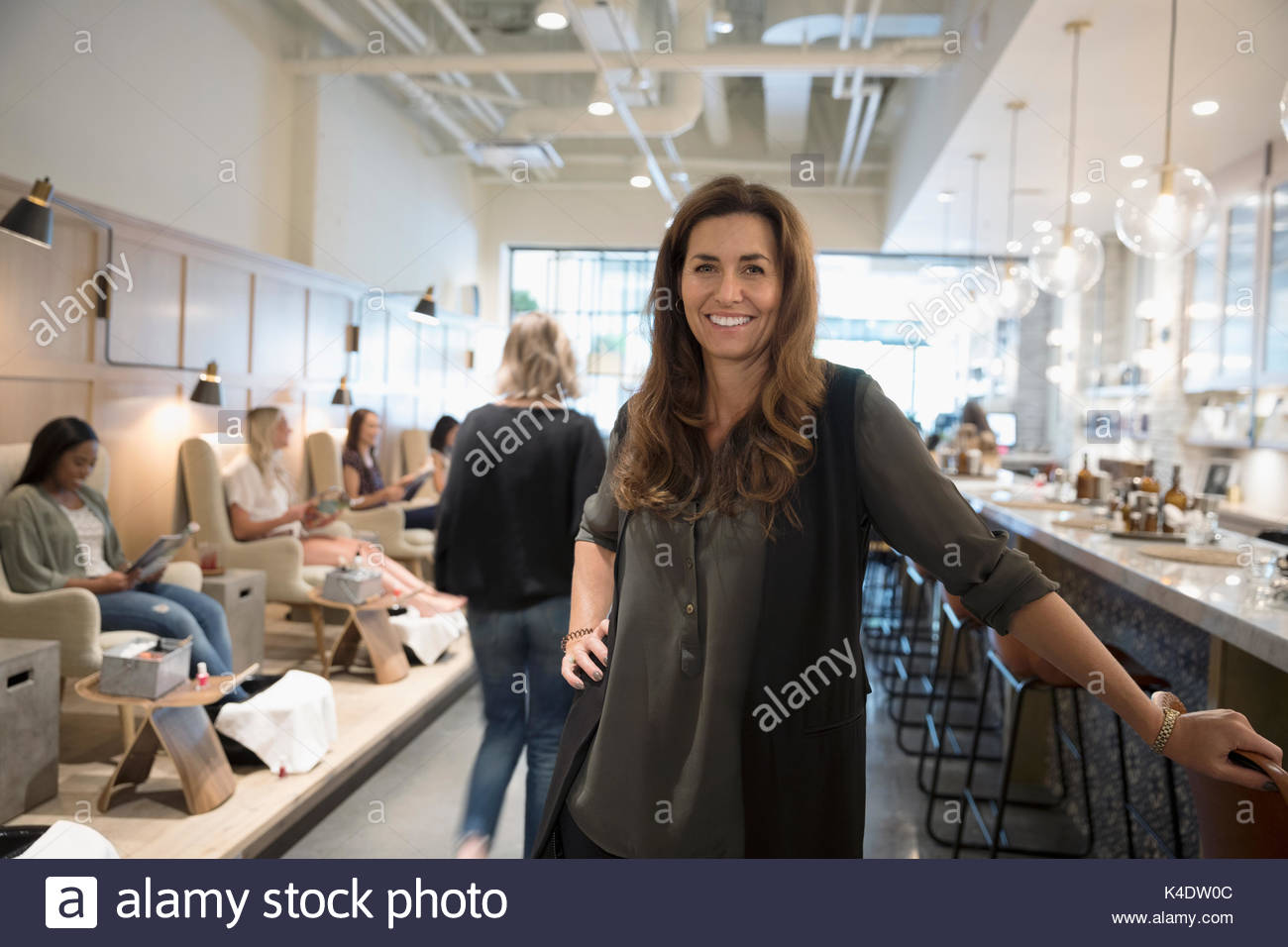 Portrait confident, smiling nail salon owner Stock Photo Alamy