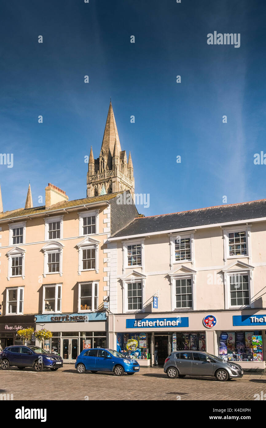 Truro - Truro Cathedral Tower seen rising above shops and stores in Boscawen street in Truro City centre. Stock Photo