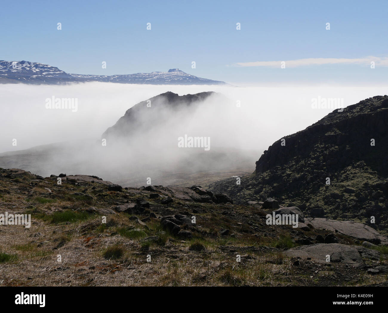 Landscape In The North East Of Iceland, Wafts Of Mist Over Holmanes Fjord Stock Photo