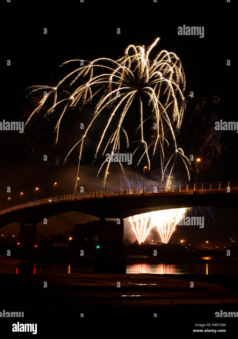 Firework Display at Barnstaple Rugby Club, taken from the banks of the River Taw in Barnstaple, Devon, England. Organised by Barnstaple  Round Table Stock Photo