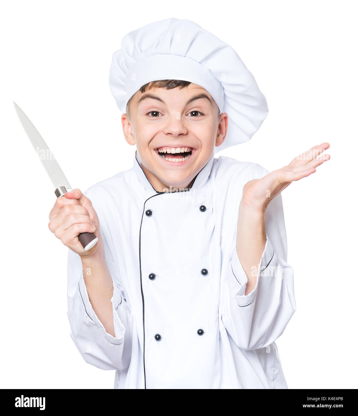 Teen boy wearing chef uniform Stock Photo Alamy