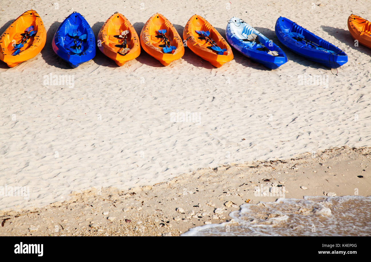 colorful kayaks on the beach Stock Photo - Alamy