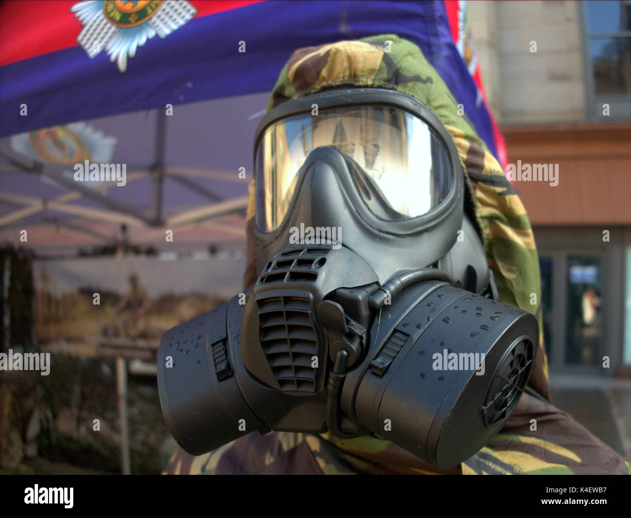 army recruitment dummy with gas mask street display replicating combat role Stock Photo