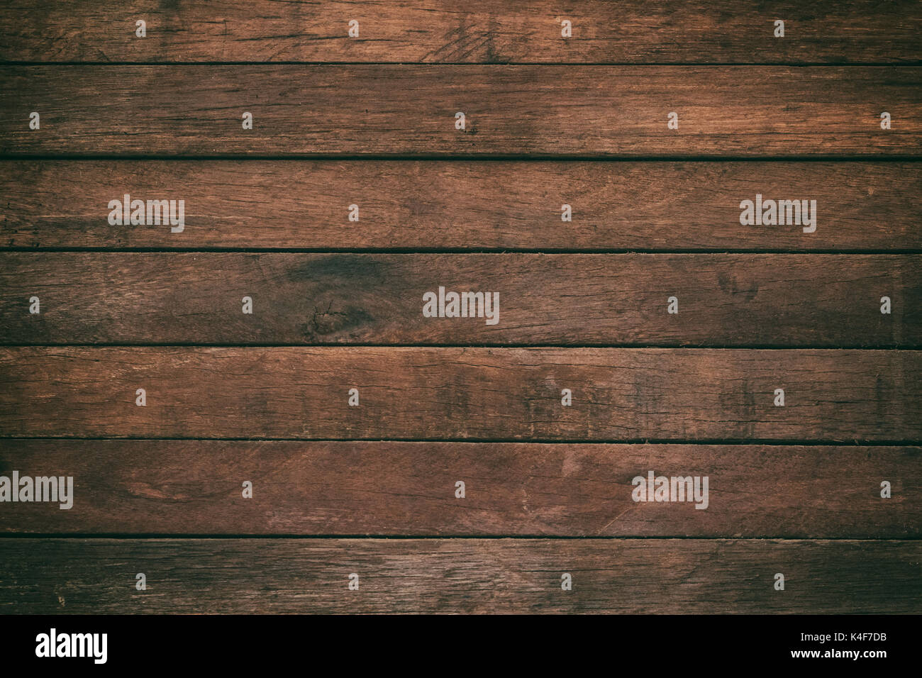 Vintage surface wood table and rustic grain texture background. Close up of dark rustic wall made of old wood table planks texture. Rustic brown wood  Stock Photo
