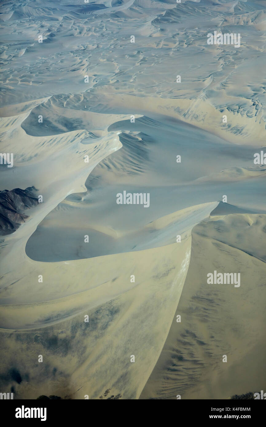 Sand dunes, near Ica, Peru, South America - aerial Stock Photo
