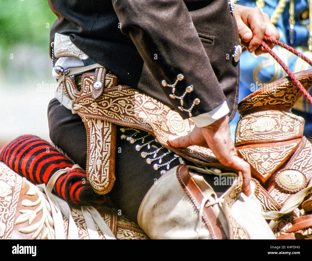 fancy pistol of a Mexican Vaquero  (Cowboy)  at a Charreada {Rodeo) event. Stock Photo