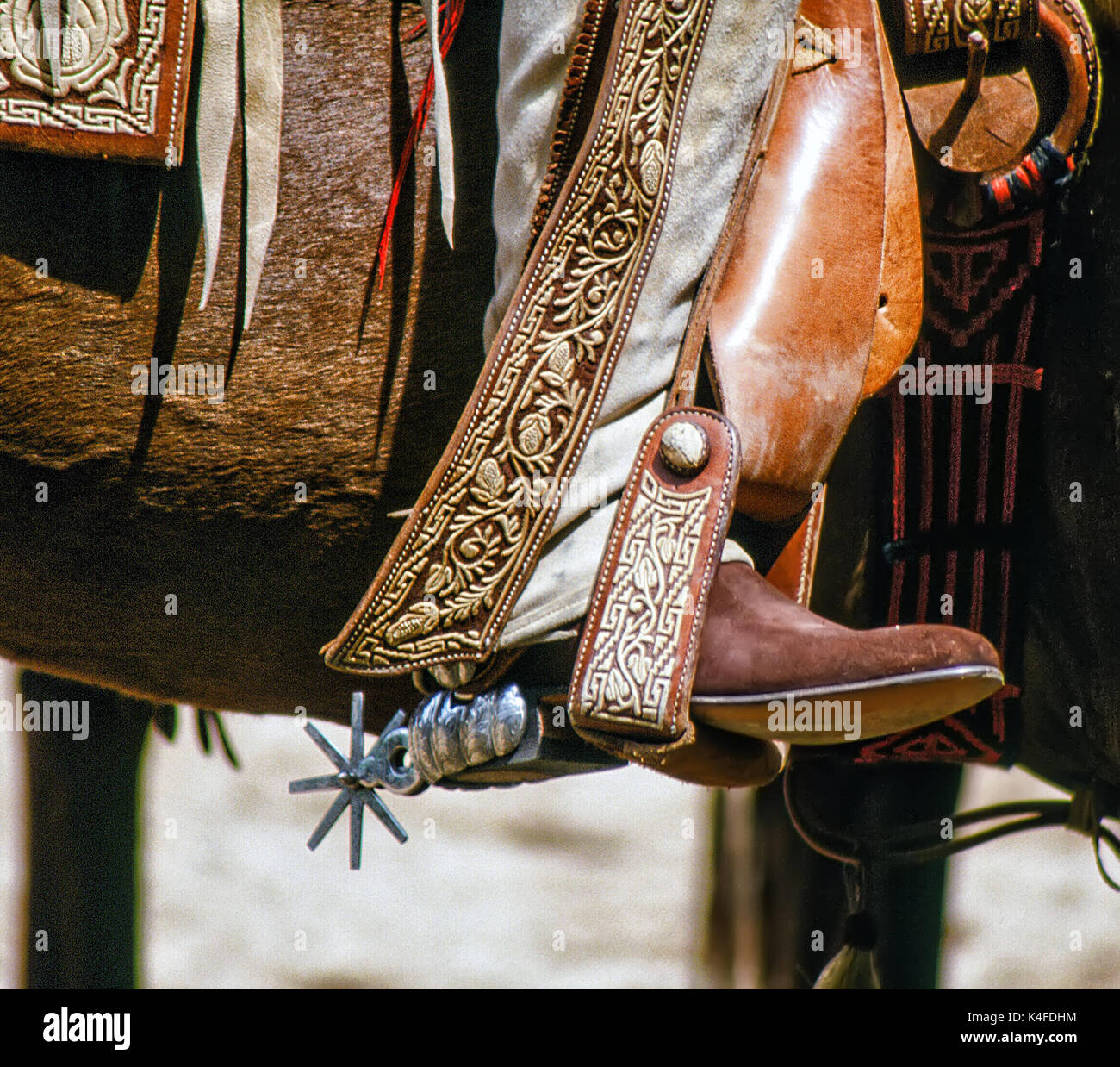 Boots and spures of a Mexican Vaquero  (Cowboy)  at a Charreada {Rodeo) event. Stock Photo