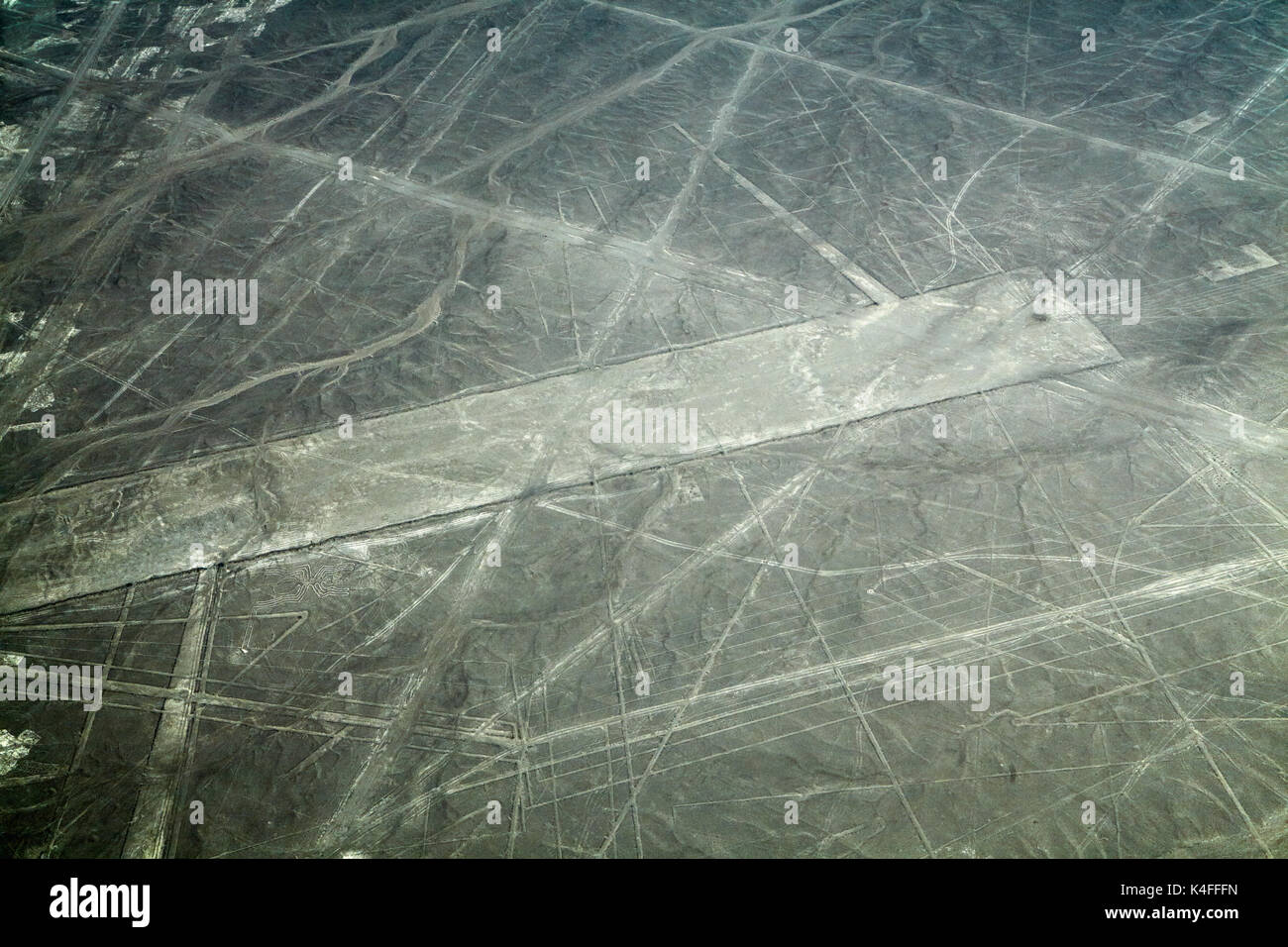 Nazca Lines including The Spider, (ancient geoglyphs and World Heritage Site), near Nazca, Ica Region, Peru, South America - aerial Stock Photo