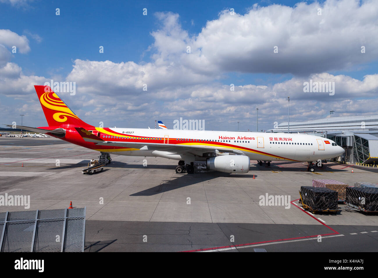 Hainan Airlines airplane parked in Prague airport terminal. Headquartered in Haikou, Hainan, People's Republic of China Stock Photo