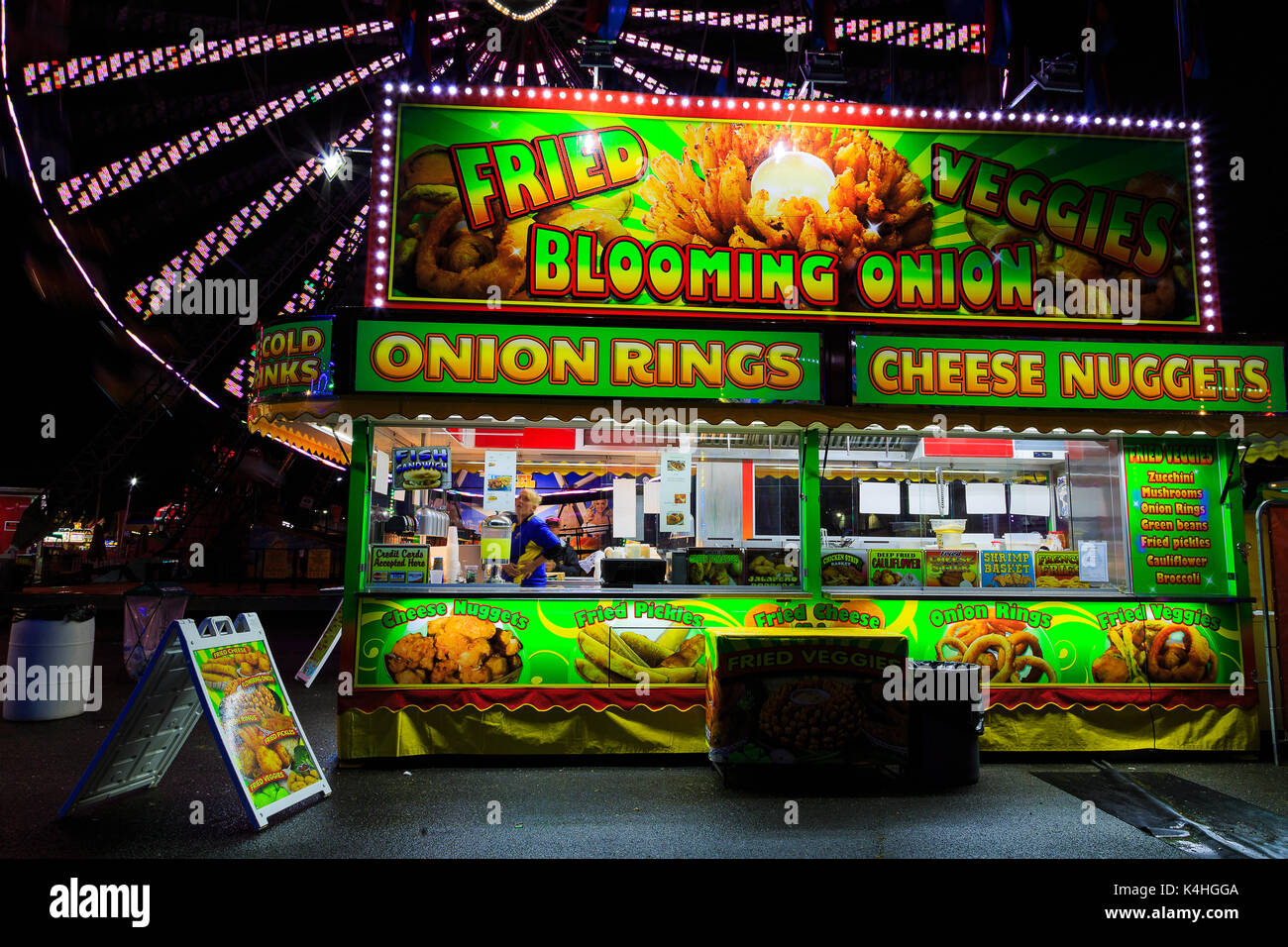 Hoosic Valley county Schaghticoke county fair with the lights, reflections, rides, on a rainy