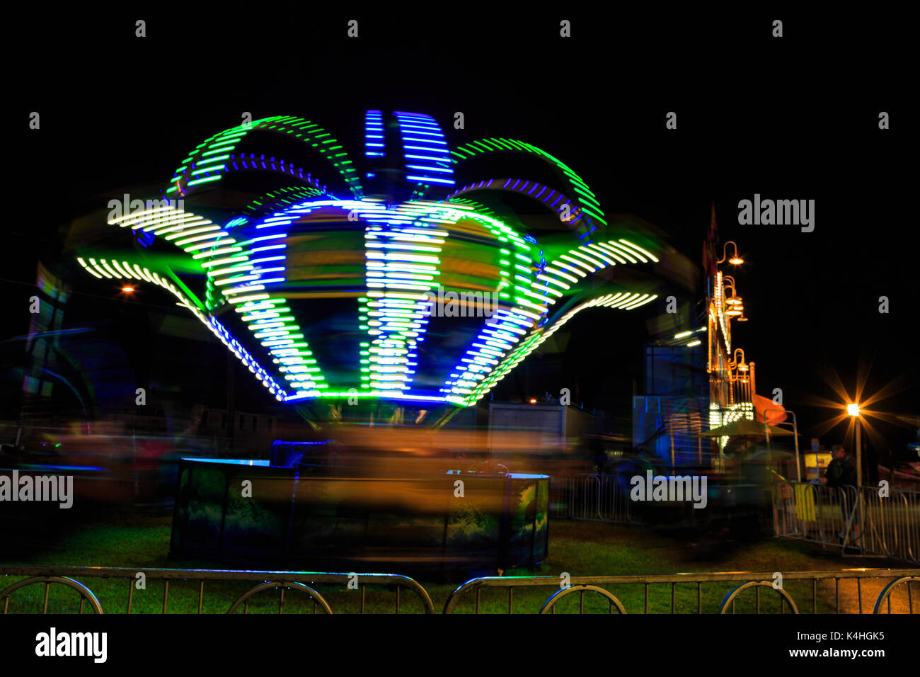 Hoosic Valley county Schaghticoke county fair with the lights, reflections, rides, on a rainy