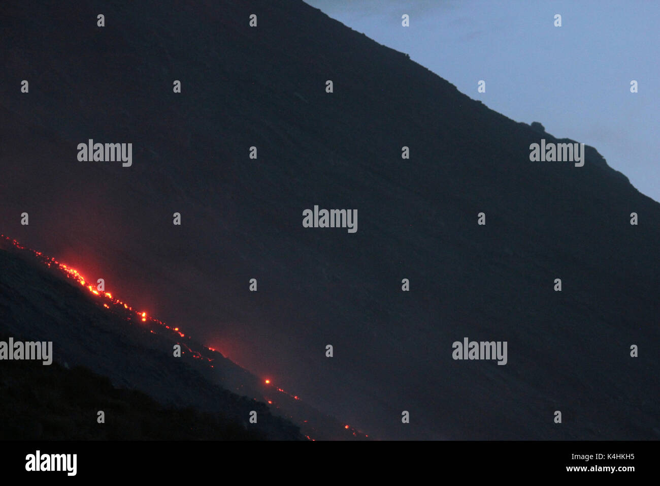 Lava rocks rolling down Stromboli in the Italian Aeolian Islands Stock Photo