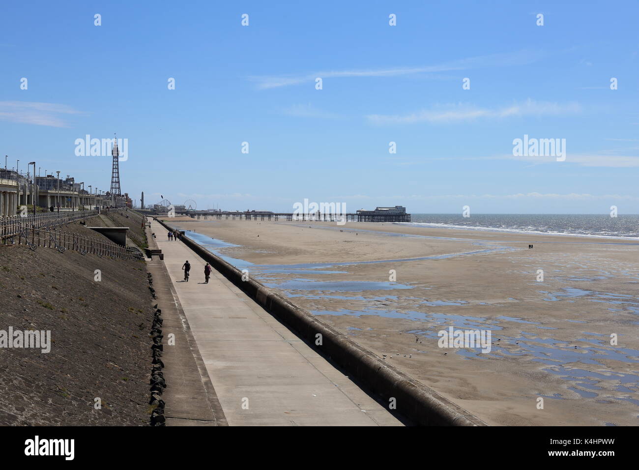 Blackpool North Shore, beach and promenade looking south to the North Pier and the famous Blackpool Tower. Stock Photo