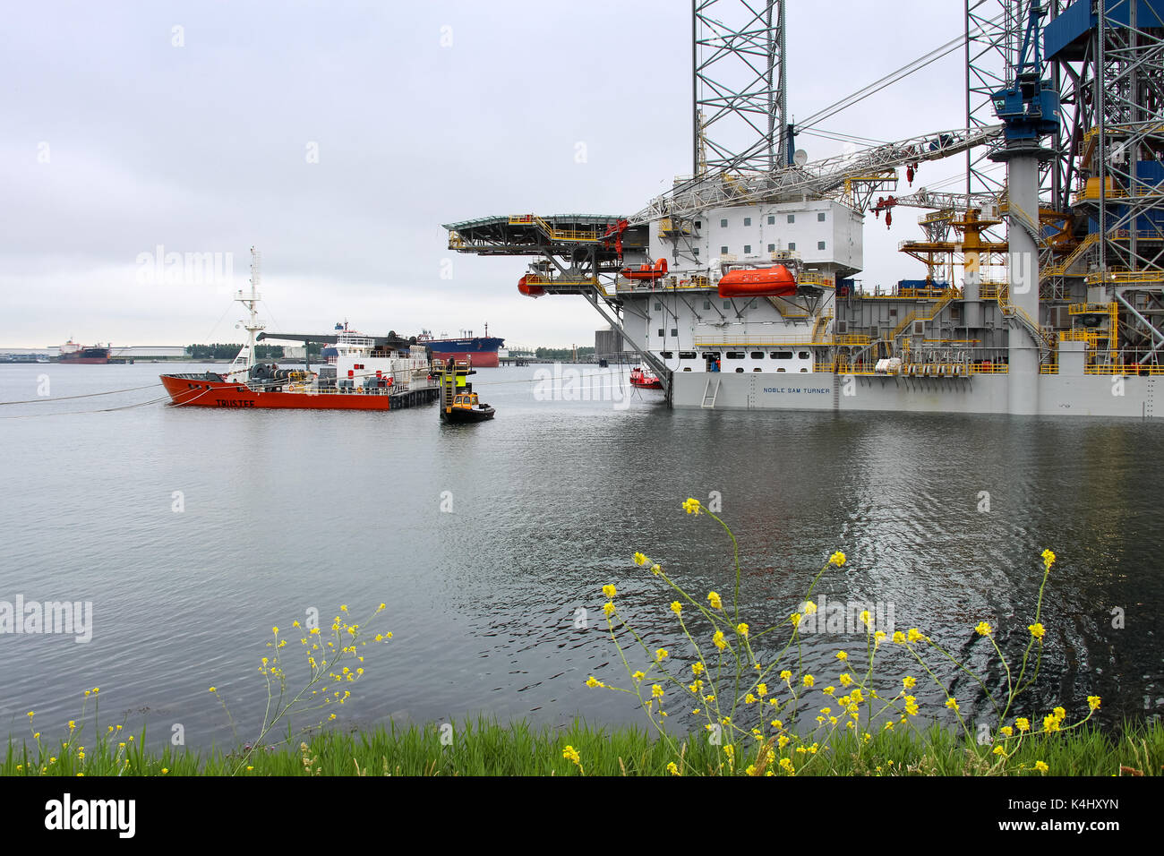 Rotterdam, the Netherlands, May 29, 2014: The jack-up rig Noble Sam Turner is being discharged from the Dockwise semi-submersible vessel Trustee Stock Photo