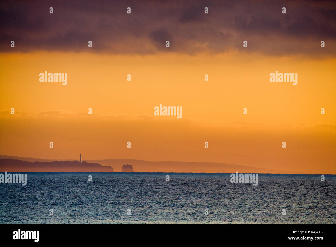 Sunrise over ocean looking toward Split Point Light Station at Aireys ...