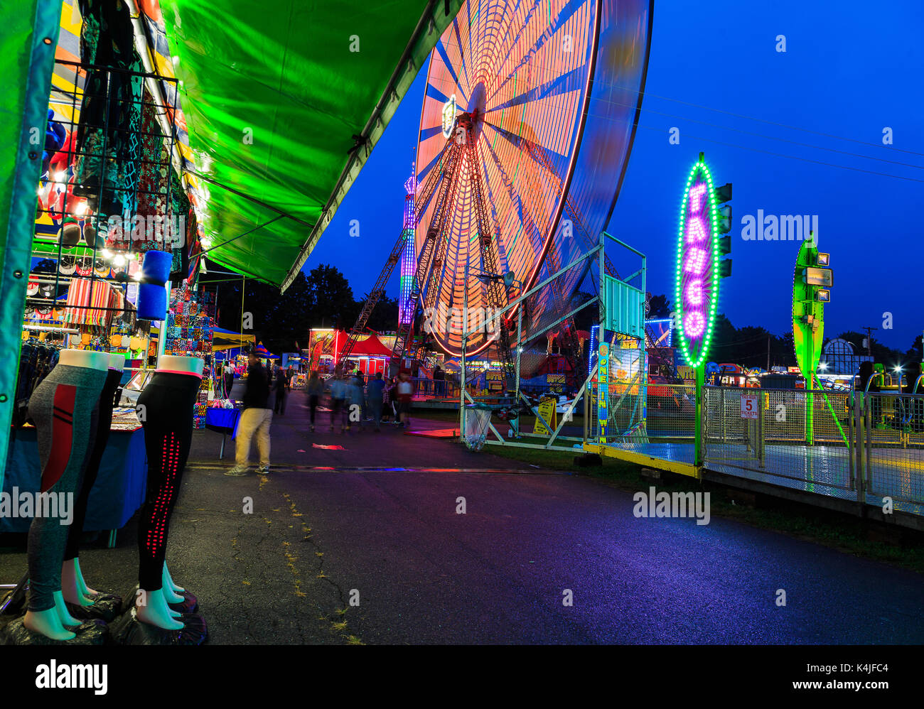 Hoosic Valley county Schaghticoke county fair with the lights, reflections, rides, on a rainy