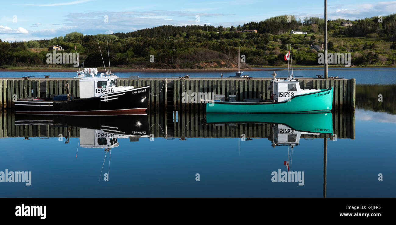 Fishing trawlers moored at dock, Inverness Harbour, Mabou, Cape Breton Island, Nova Scotia, Canada Stock Photo