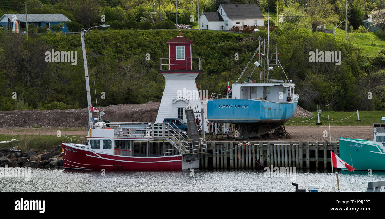 Fishing trawlers moored at dock, Pleasant Bay, Cape Breton Island, Nova