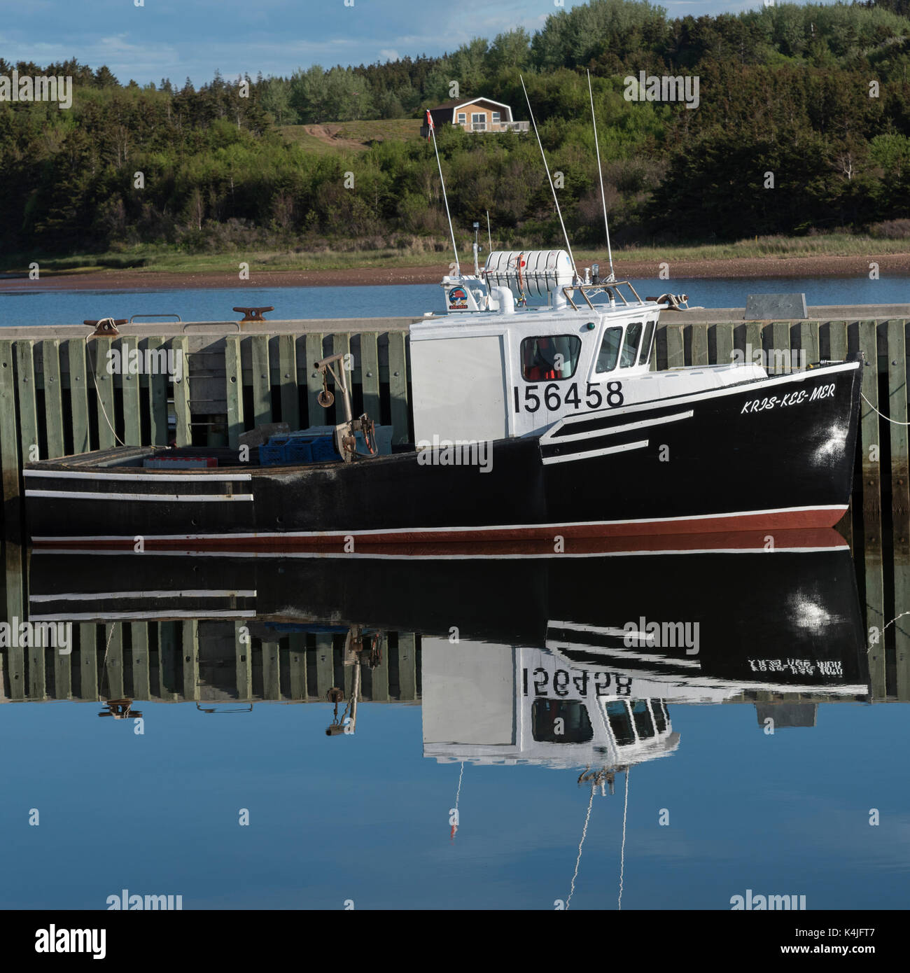 Fishing boat moored at dock, Mabou, Cape Breton Island, Nova Scotia, Canada Stock Photo