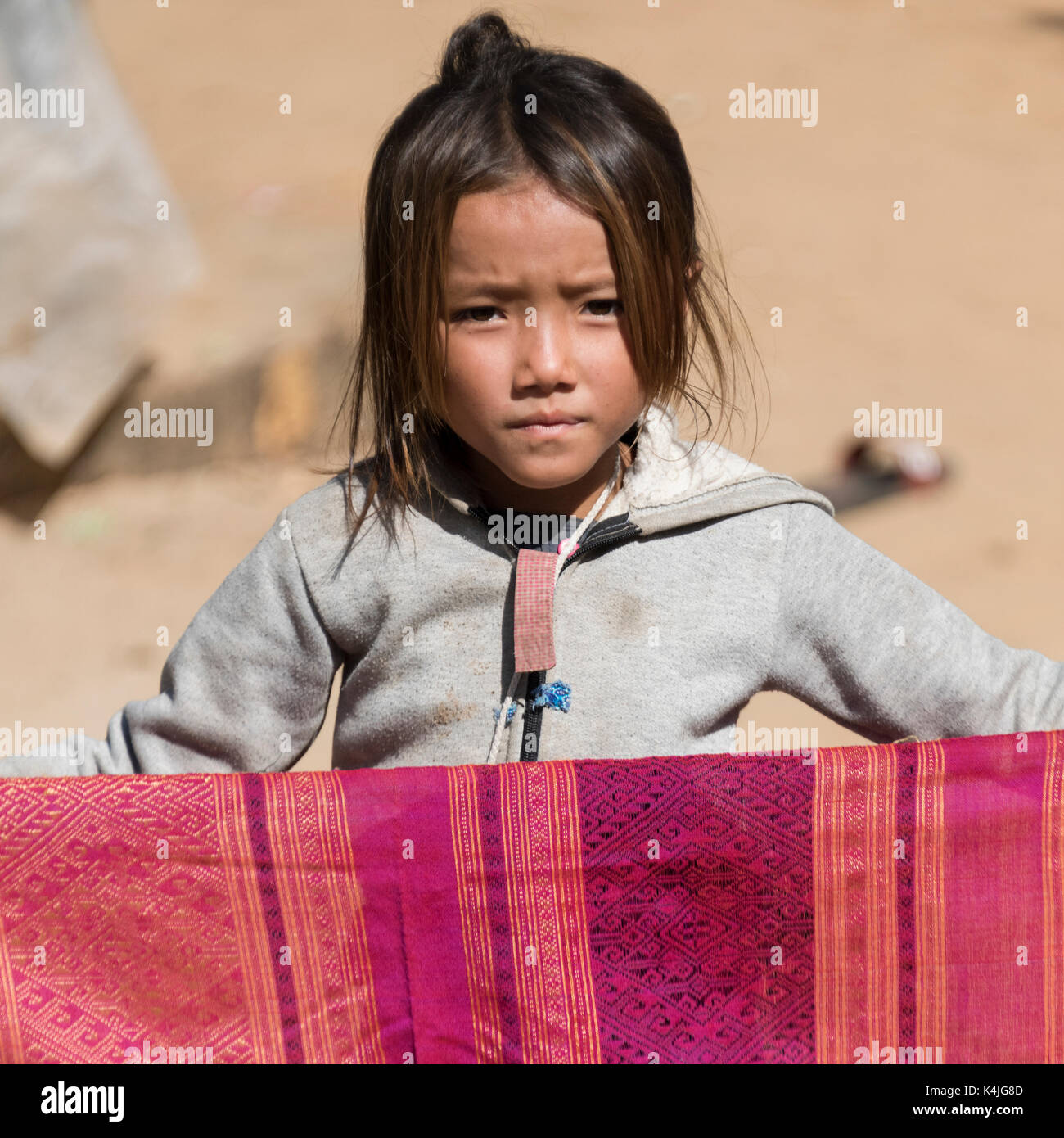 Portrait of local girl holding shawl, Sainyabuli Province, Laos Stock Photo