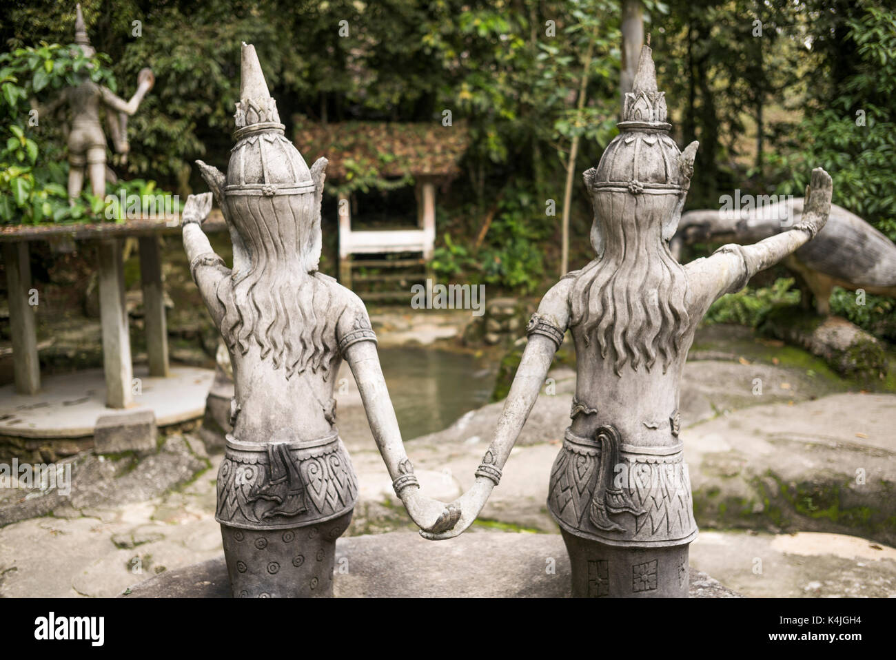Rear view of two statues in Heaven's Garden, Koh Samui, Surat Thani Province, Thailand Stock Photo